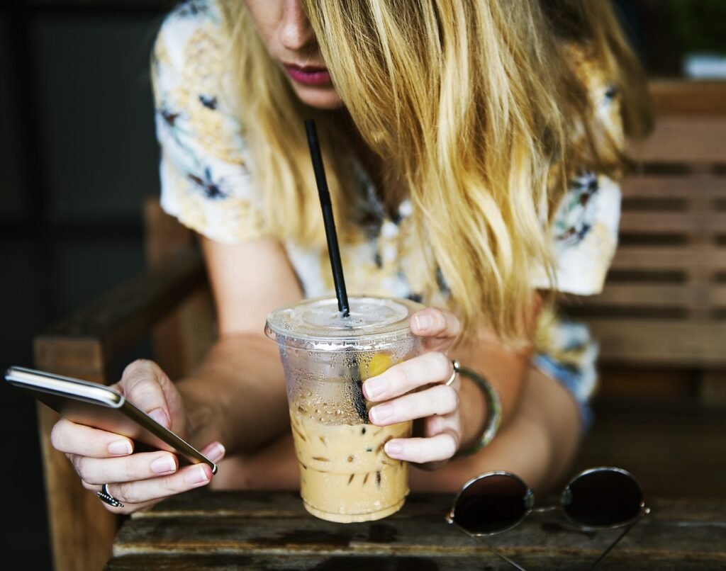cup, drink, girl, communicate, woman, smartphone, mobile phone, communication, women, sitting, beverage