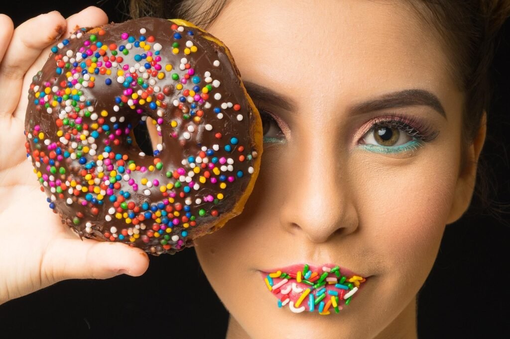 girl, face, doughnut, portrait, makeup, cosmetics, sweets, dessert, treat, young woman, female, female face, model, female model, look, woman, food
